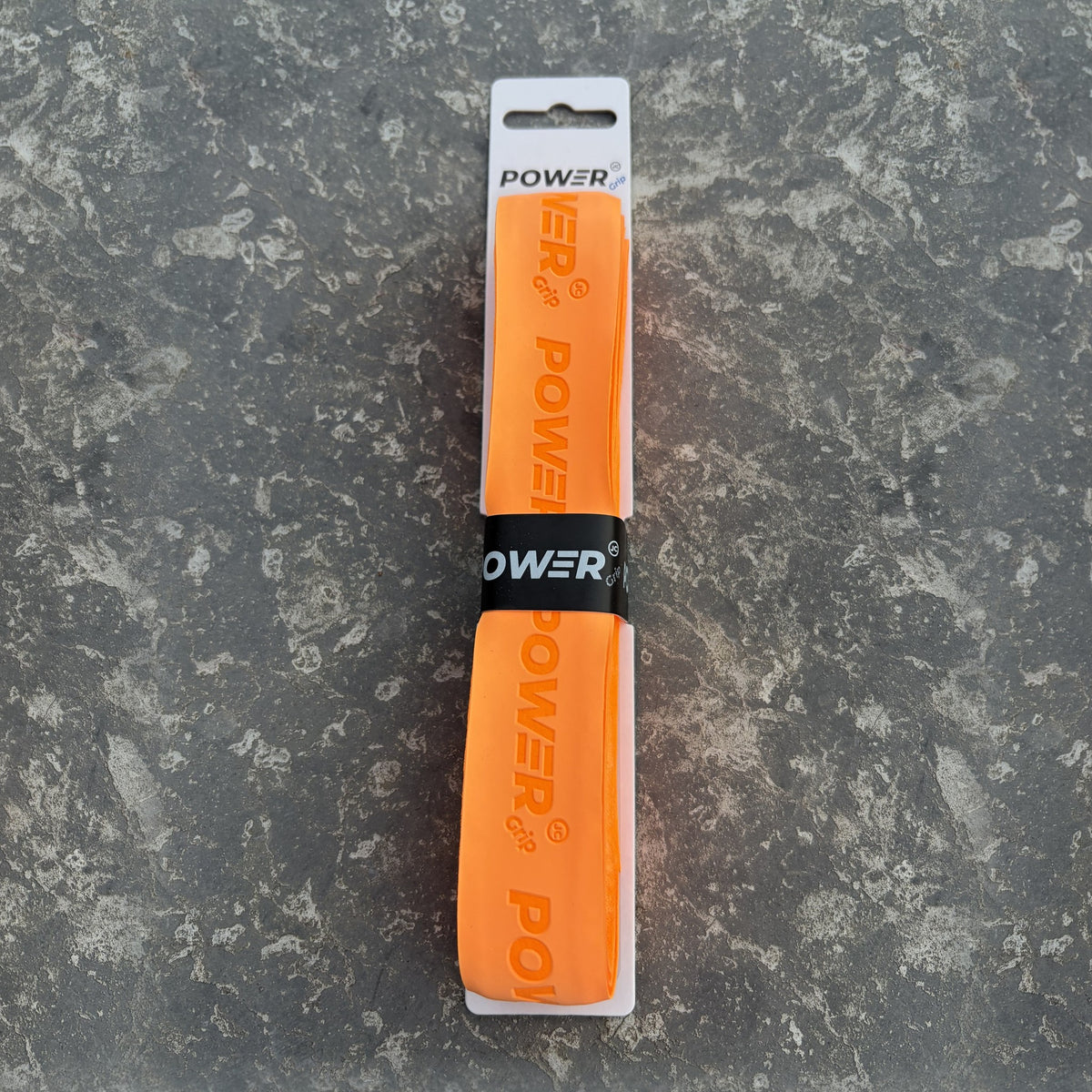 Orange Power Grip XL hurling grip in its packaging